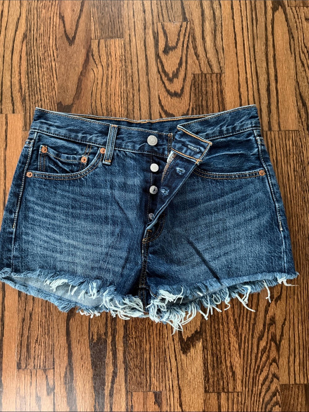 Levi’s Women’s Dark Blue Denim Cutoff Shorts with Frayed Hem